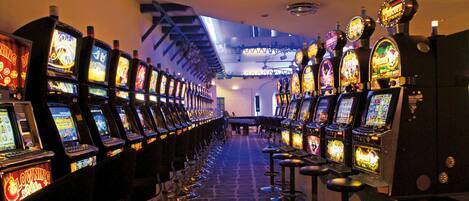 A row of slot machines in a casino.