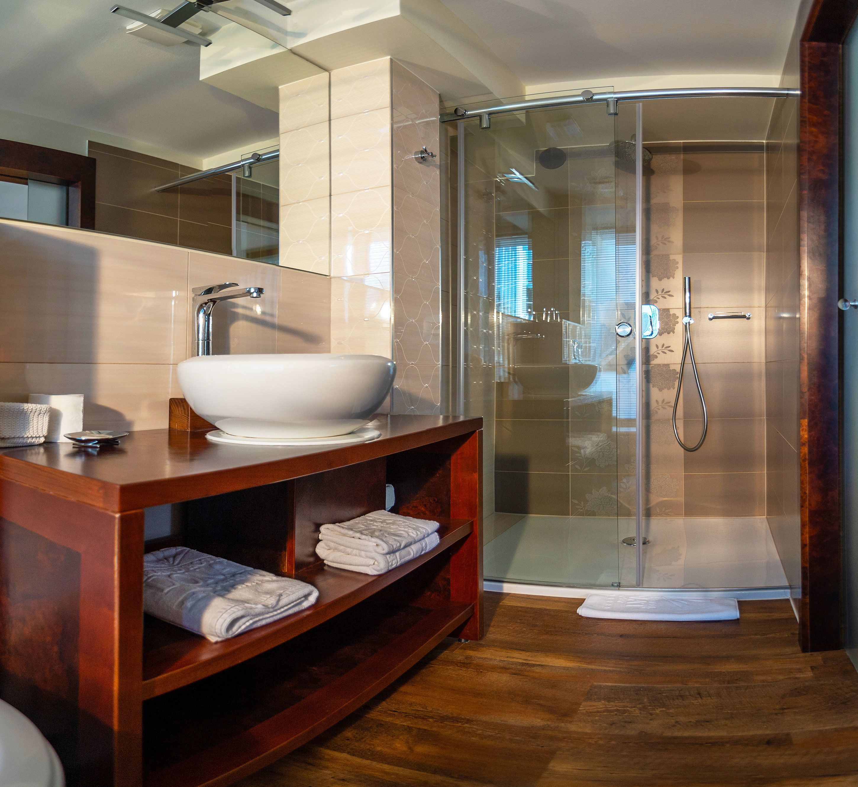 bathtub, hair dryer, bathrobes, slippers