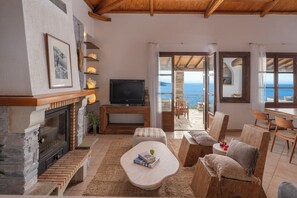 Adrina VIP Three Bedroom Heated Pool Villa | Living area | 32-inch flat-screen TV with satellite channels, TV - Adrina Resort & Spa (Skopelos)