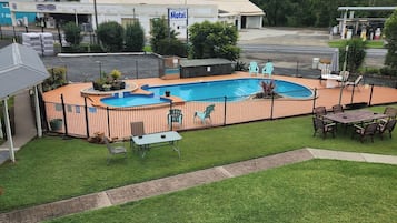 Outdoor pool, open 8:30 AM to 8:00 PM, pool loungers