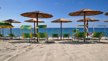 Beach nearby, white sand, sun-loungers, beach umbrellas