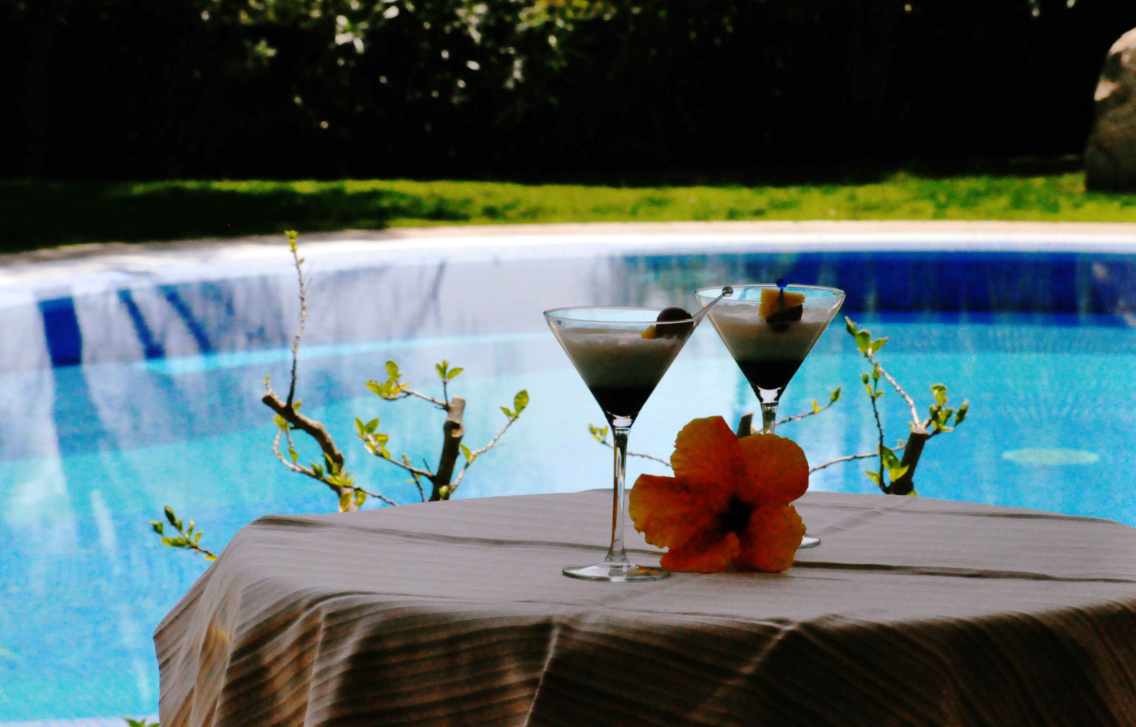 outdoor pool, pool umbrellas, pool loungers