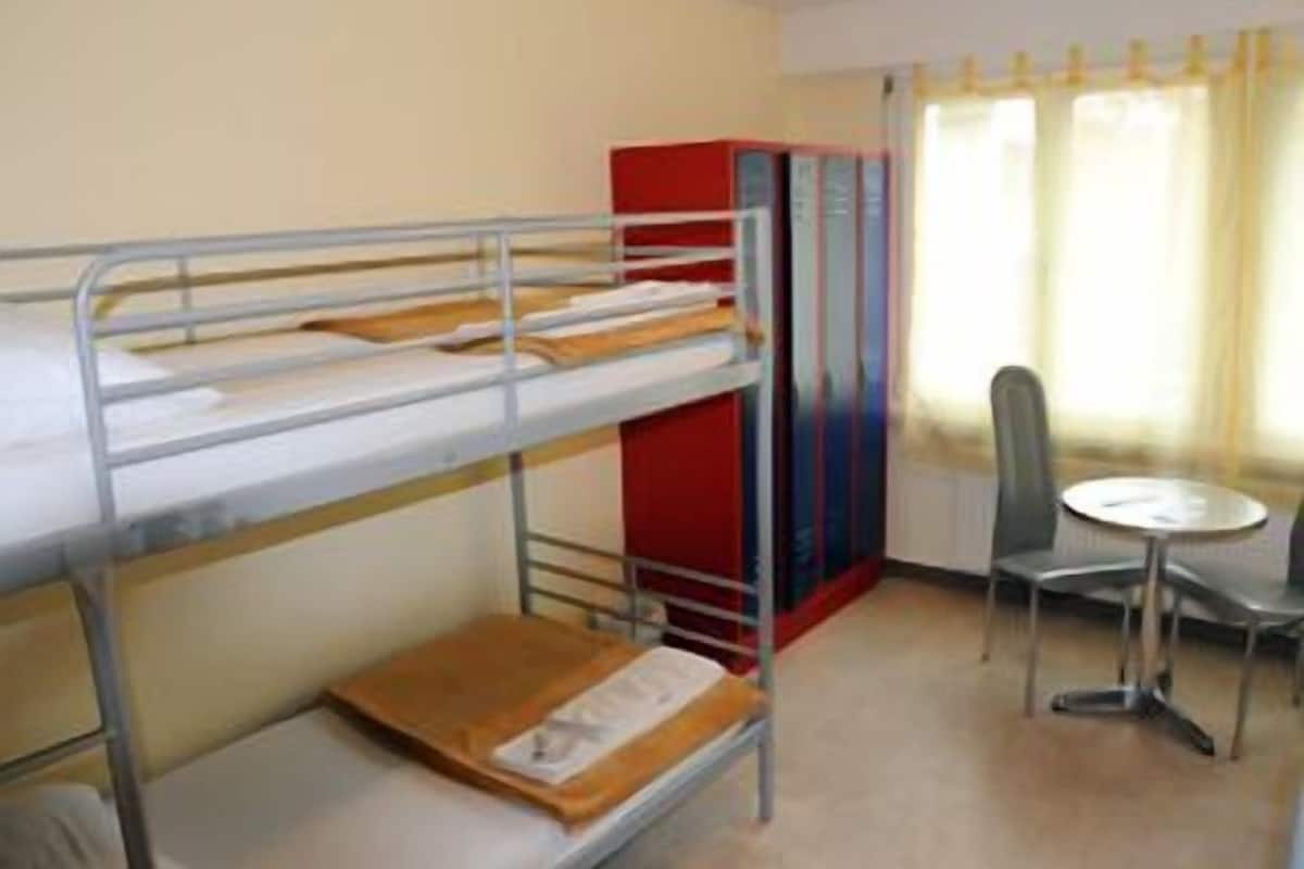 One Bed in a Coed Dorm Room with Shared Bathroom 4 beds | Desk, iron/ironing board, free WiFi, bed sheets