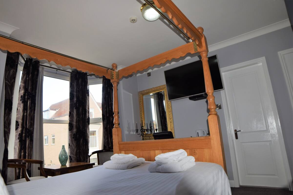 four-poster double with spa bath | premium bedding, in-room safe, desk, soundproofing