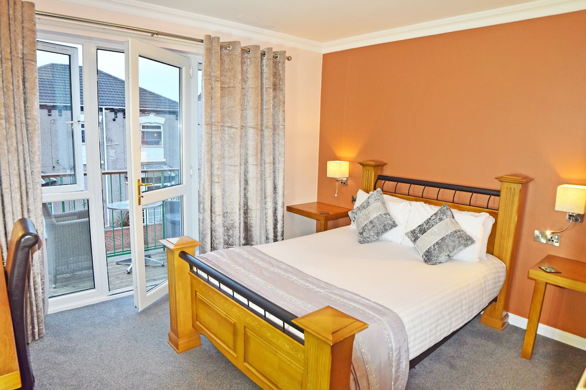 executive double with balcony and spa bath | premium bedding, in-room safe, desk, soundproofing