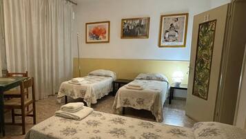 Triple Room, Shared Bathroom | Individually furnished, free WiFi