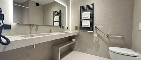 Shower, rainfall showerhead, towels, soap