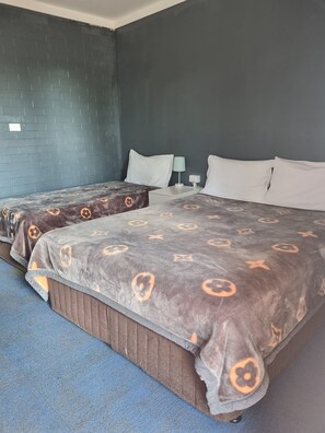 Family Room | Premium bedding, Select Comfort beds, desk, soundproofing