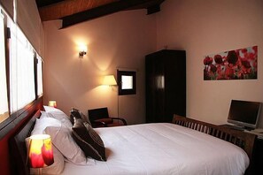 Premium bedding, down duvets, pillow-top beds, in-room safe