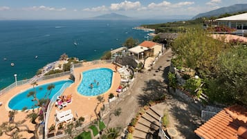 Seasonal outdoor pool, pool loungers