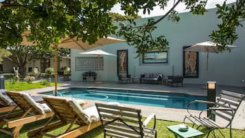 Outdoor pool, pool umbrellas, pool loungers