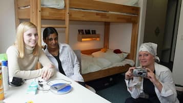 Basic Quadruple Room, City View | Hypo-allergenic bedding, in-room safe, desk, blackout drapes