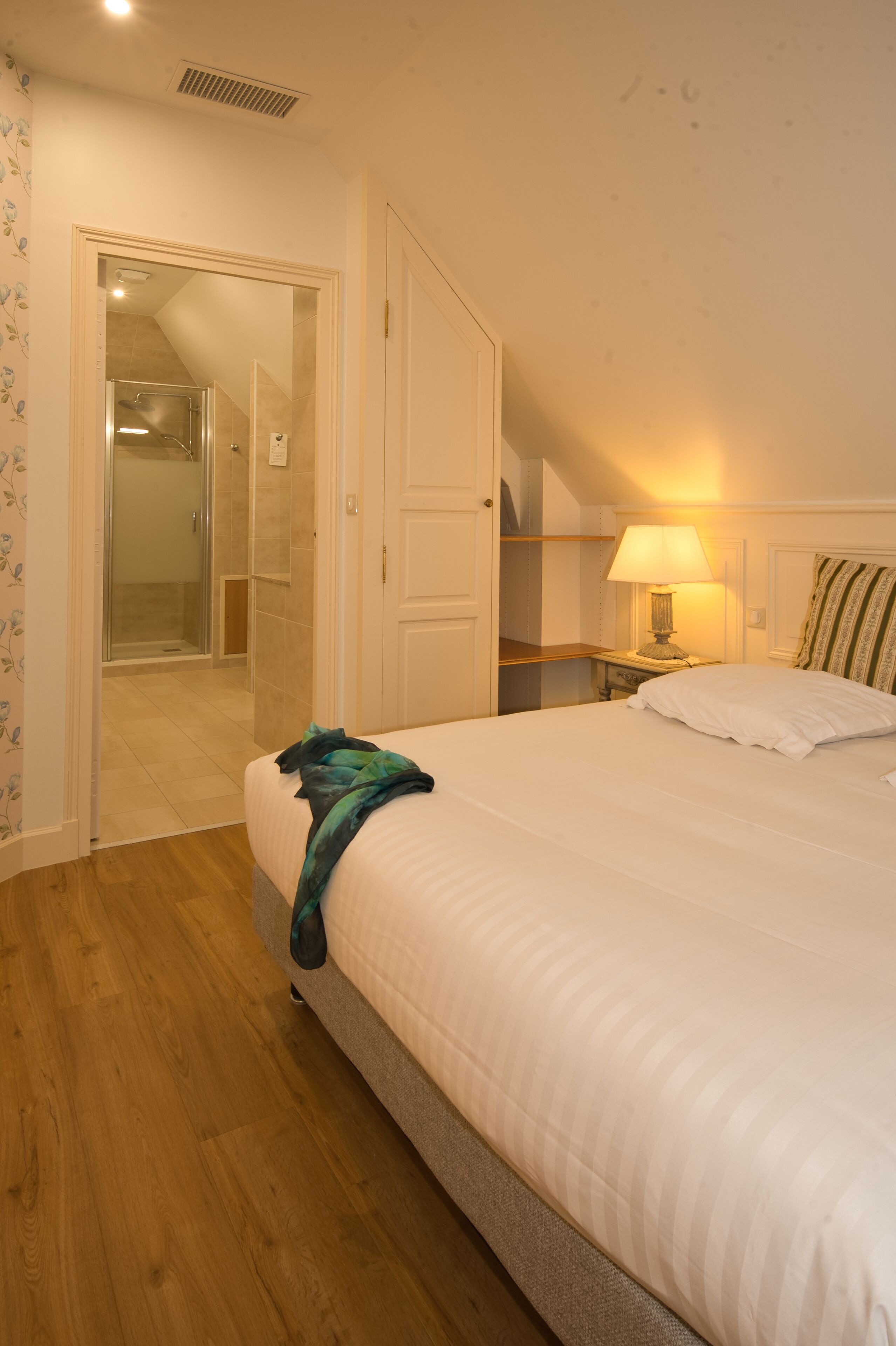 charming double attic premium room | premium bedding, select comfort beds, in-room safe