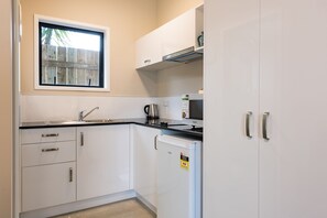 Blue Dolphin Block Superior Studio, 1 King Bed | Private kitchenette | Mini-fridge, microwave, coffee/tea maker, toaster