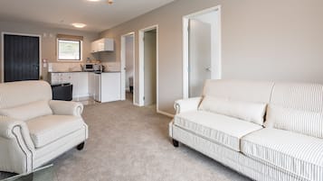 Blue Dolphin Block Superior Apartment, 2 Bedrooms | Living area | 32-inch LCD TV with satellite channels, TV
