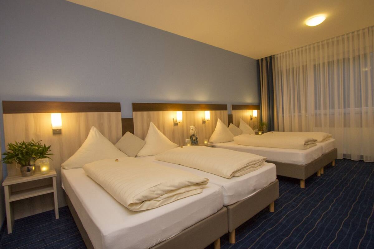 superior quadruple room, 1 bedroom, non smoking | hypo-allergenic bedding, in-room safe, individually decorated