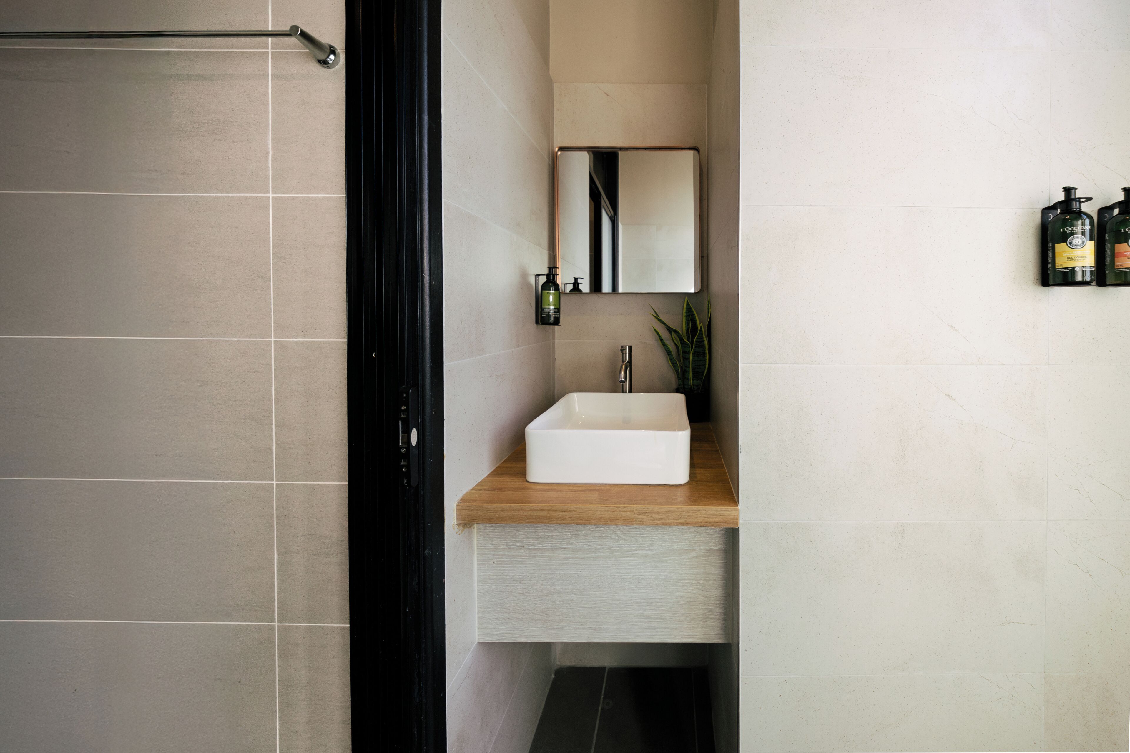 deluxe family room | bathroom | shower, rainfall showerhead, free toiletries, hair dryer