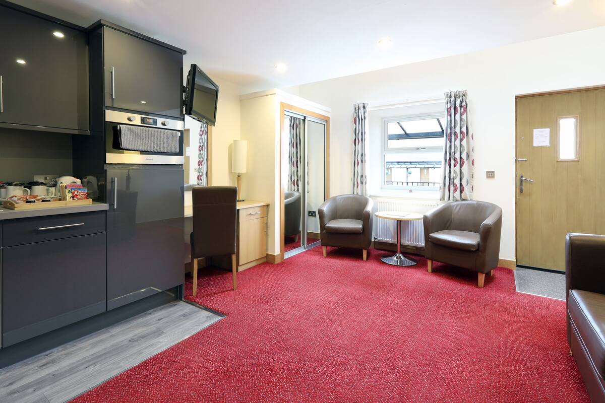 suite, mezzanine | private kitchen | full-sized fridge, microwave, electric kettle, cookware/dishes/utensils