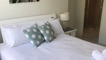 Apartment, 2 Bedrooms, Ocean View | Iron/ironing board, cribs/infant beds, free WiFi, bed sheets