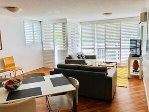 Apartment, 3 Bedrooms, Pool or Garden View | Living area