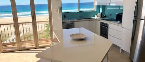 Three Bedroom Apartment Beachfront | Private kitchen | Fridge, microwave, oven, stovetop