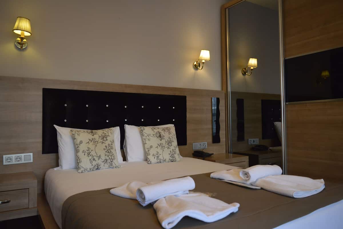 家庭三人房 | 意大利 Frette 床单、高档床上用品、熨斗/熨板、免费 WiFi