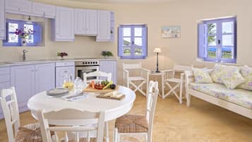 Full-sized fridge, oven, stovetop, dishwasher