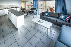 Deluxe Cabin | Living area | 50-cm TV with premium TV channels