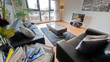 Superior Apartment, Balcony | Living area | 42-inch flat-screen TV with digital channels, TV, DVD player