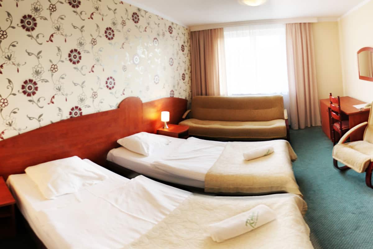 Premium bedding, desk, blackout drapes, iron/ironing board