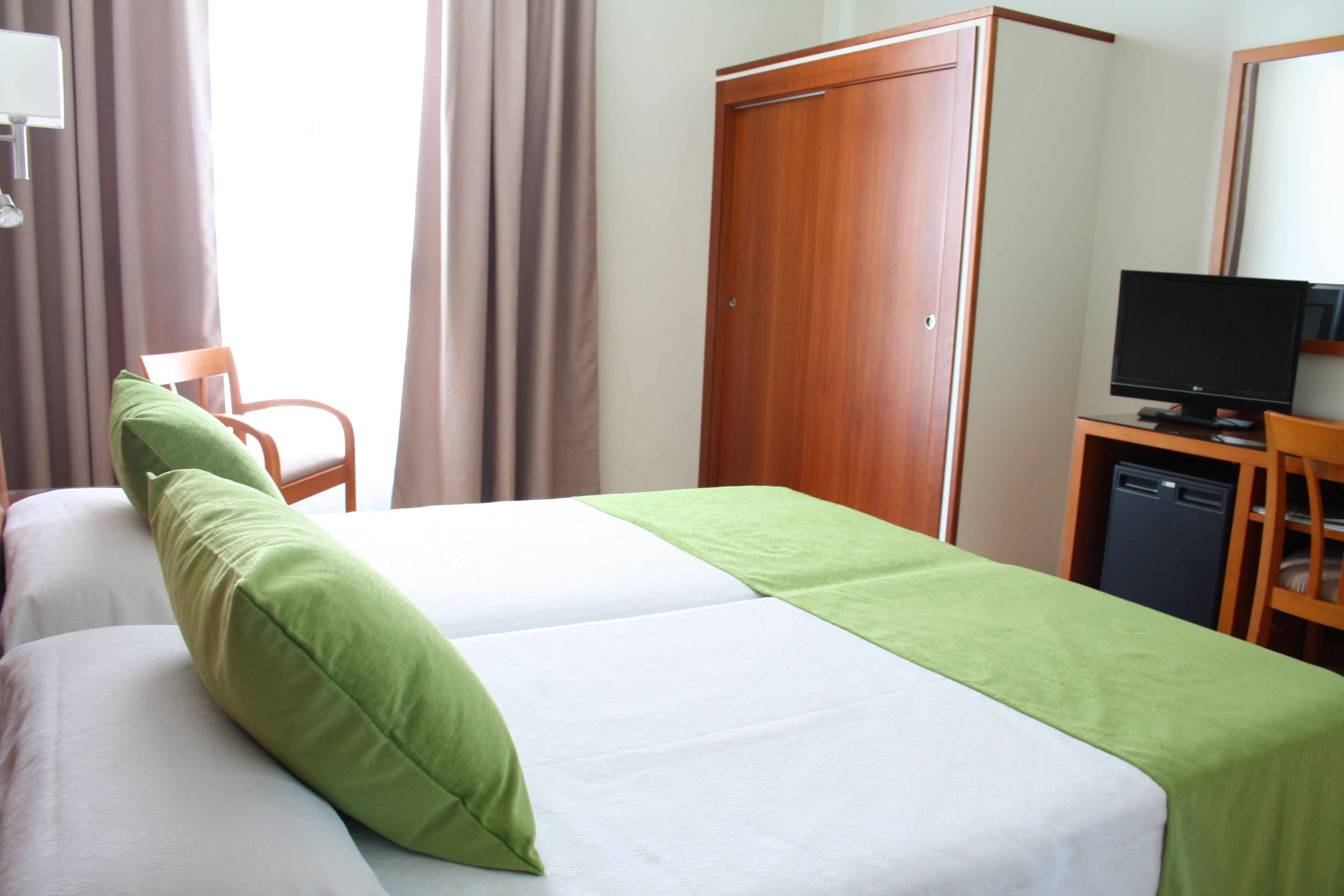 in-room safe, desk, blackout curtains, iron/ironing board