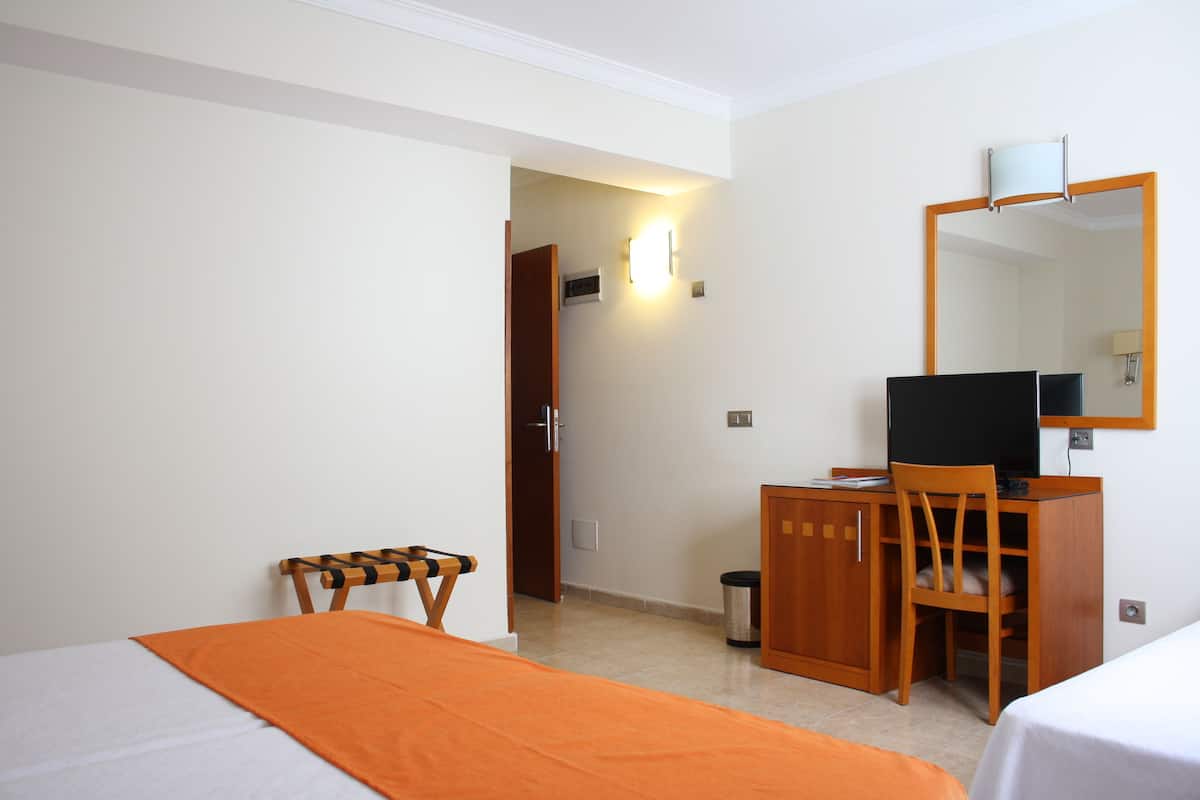 triple room | in-room safe, desk, blackout curtains, iron/ironing board