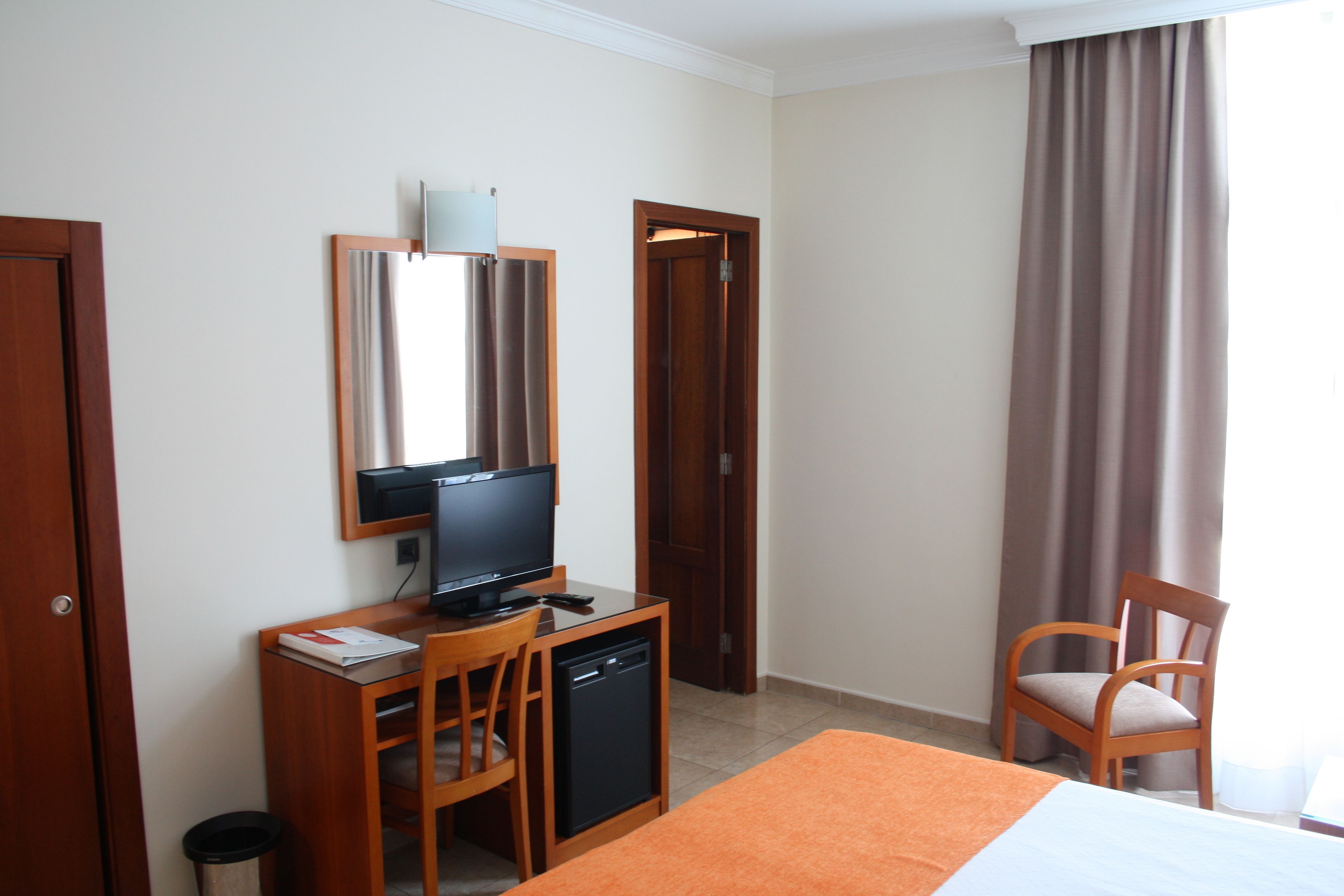 in-room safe, desk, blackout curtains, iron/ironing board