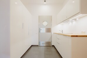 Apartment, 1 Bedroom | Private kitchen | Fridge, stovetop, coffee/tea maker, electric kettle