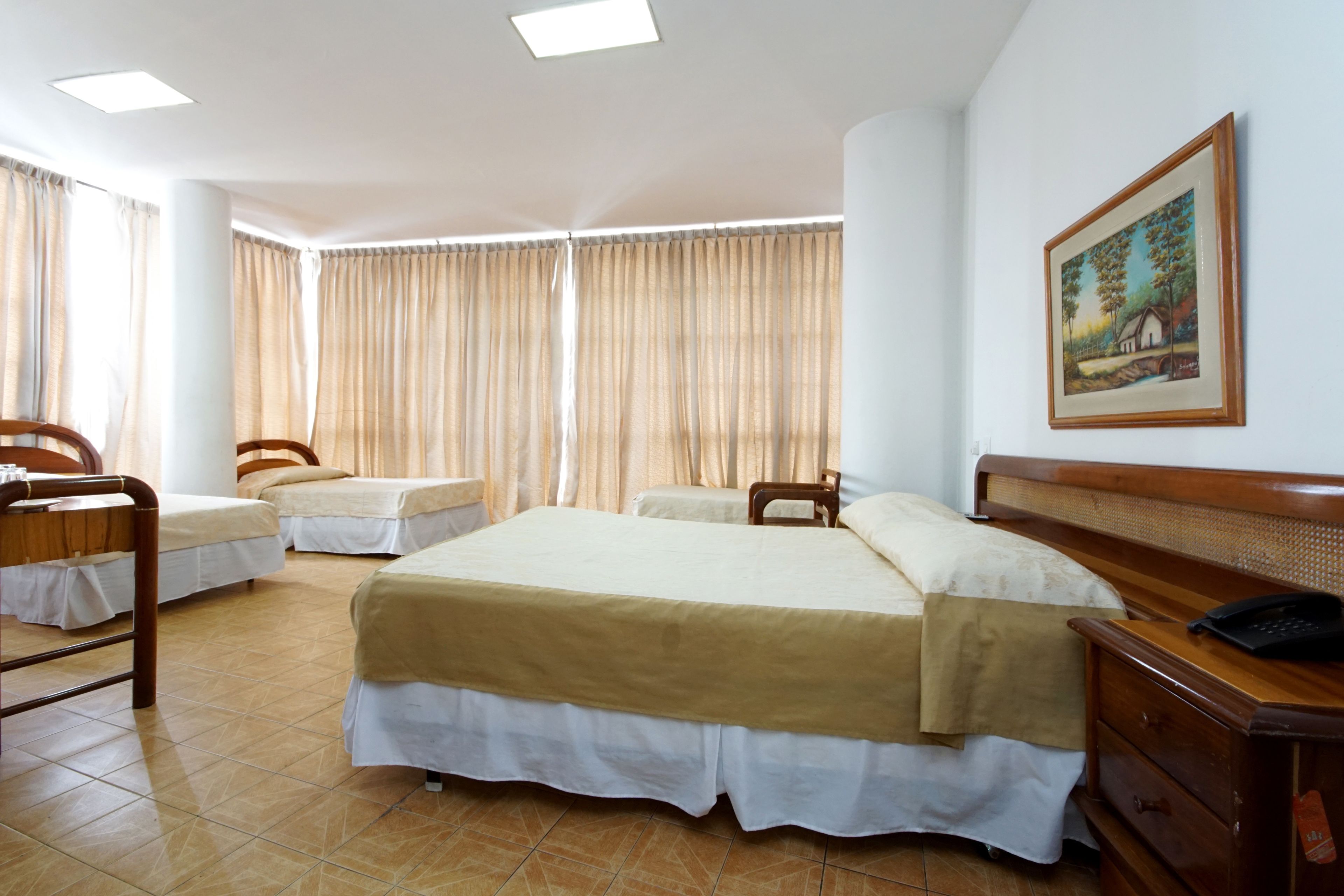 Standard Quadruple Room | Premium bedding, in-room safe, desk, iron/ironing board