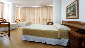 Standard Quadruple Room - Hotel Royal Plaza Cali (Cali)