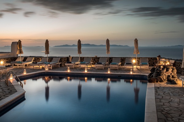 Seasonal outdoor pool, open 9:00 AM to 9:00 PM, pool umbrellas