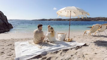 Ubicación a pie de playa, arena blanca, cabañas de playa y kayak