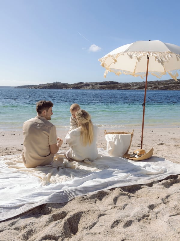 On the beach, white sand, beach cabanas, kayaking