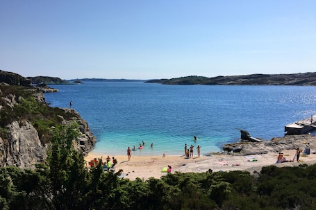 On the beach, white sand, beach cabanas, kayaking