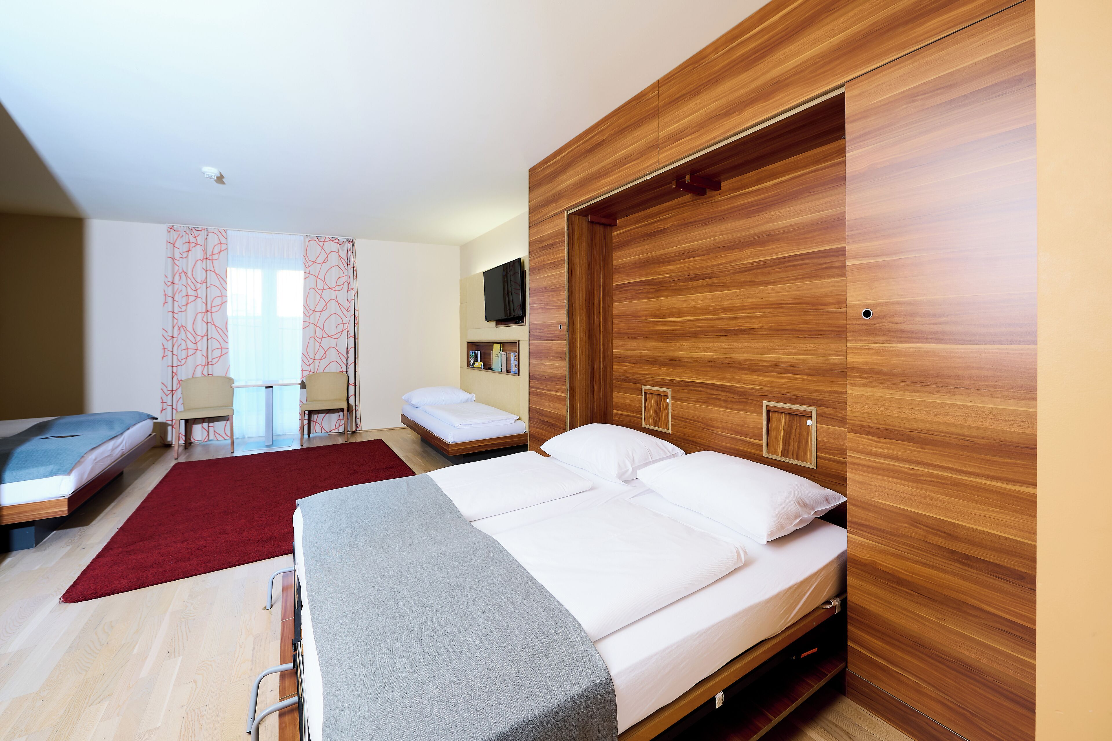 quadruple room | 1 bedroom, in-room safe, desk, blackout curtains