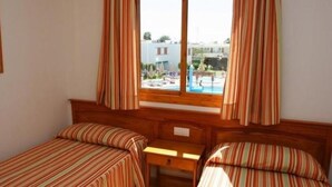 Bungalow, 2 Bedrooms | 2 bedrooms, blackout curtains, free cots/infant beds, WiFi - Bungalows Las Brisas (San Bartolomé de Tirajana)