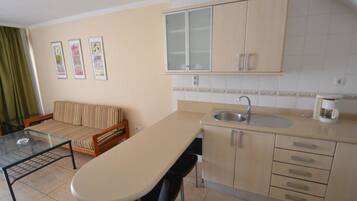 Bungalow, 2 Bedrooms | Private kitchenette | Full-sized fridge, microwave, stovetop, coffee/tea maker