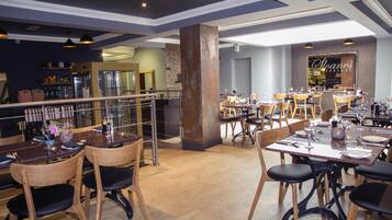 Breakfast, lunch, dinner served; international cuisine, garden views