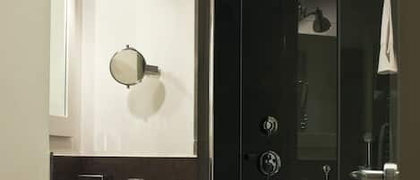 Deluxe Double Room | Bathroom | Rainfall showerhead, designer toiletries, hair dryer, slippers