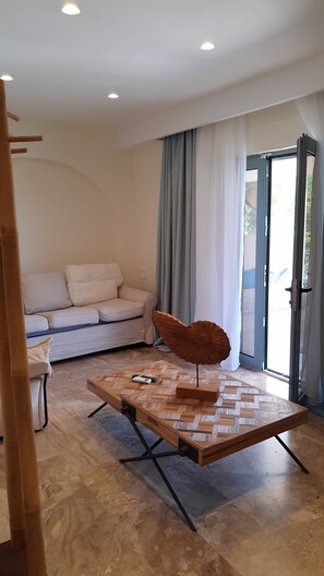 Deluxe Suite, 1 Bedroom, Sea View | Living area | LCD TV