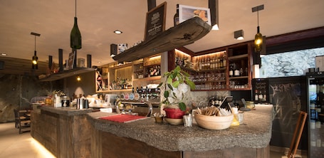 Cocktail bar, garden views, open daily