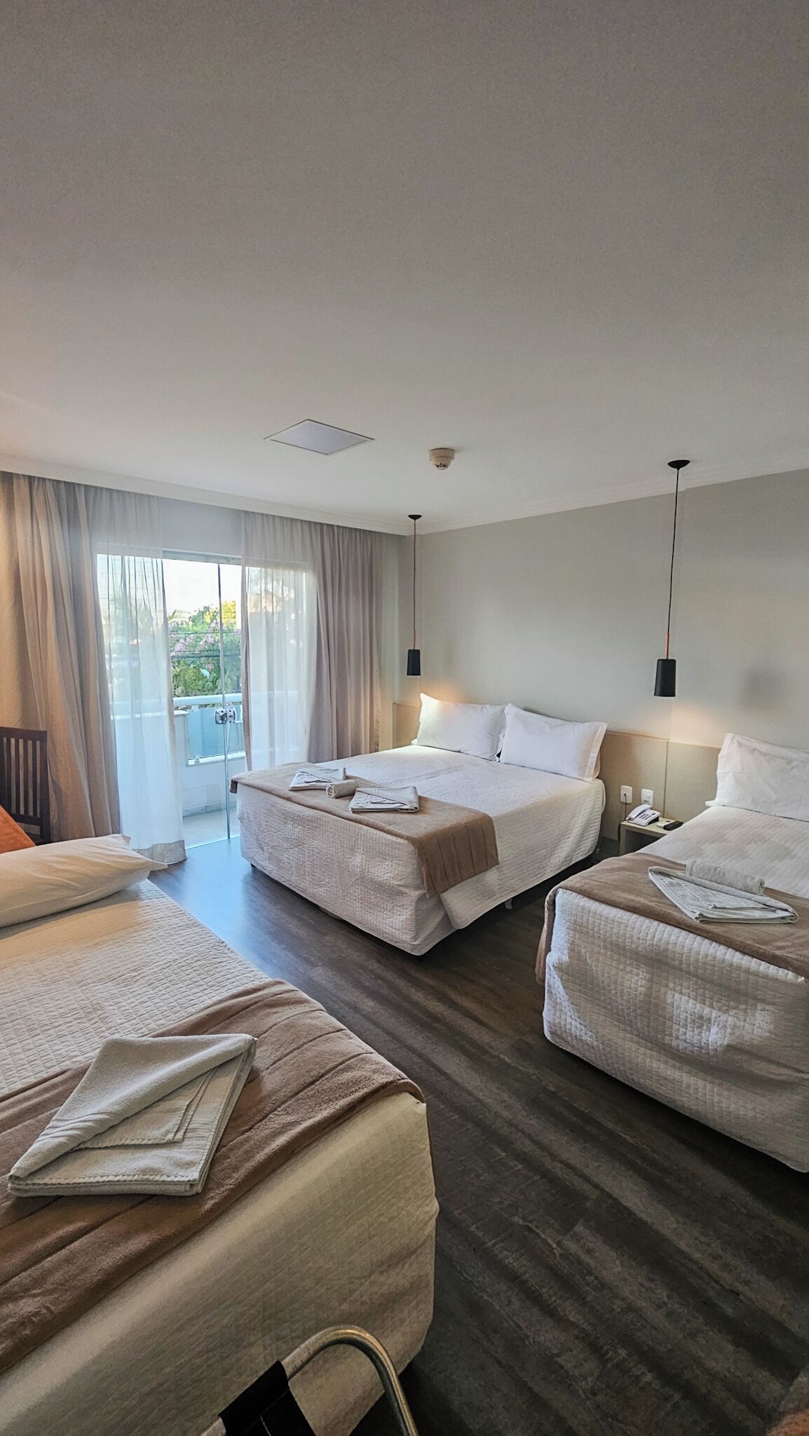 Deluxe Quadruple Room | Premium bedding, minibar, in-room safe, iron/ironing board