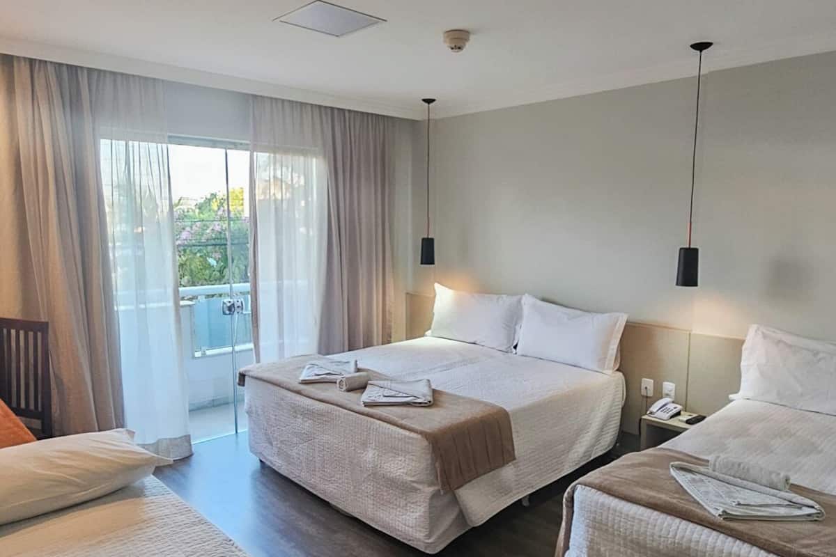 Deluxe Quadruple Room | Premium bedding, minibar, in-room safe, iron/ironing board (on request)