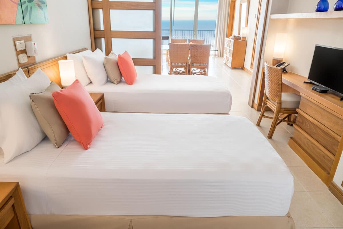 Premium bedding, down comforters, in-room safe, desk